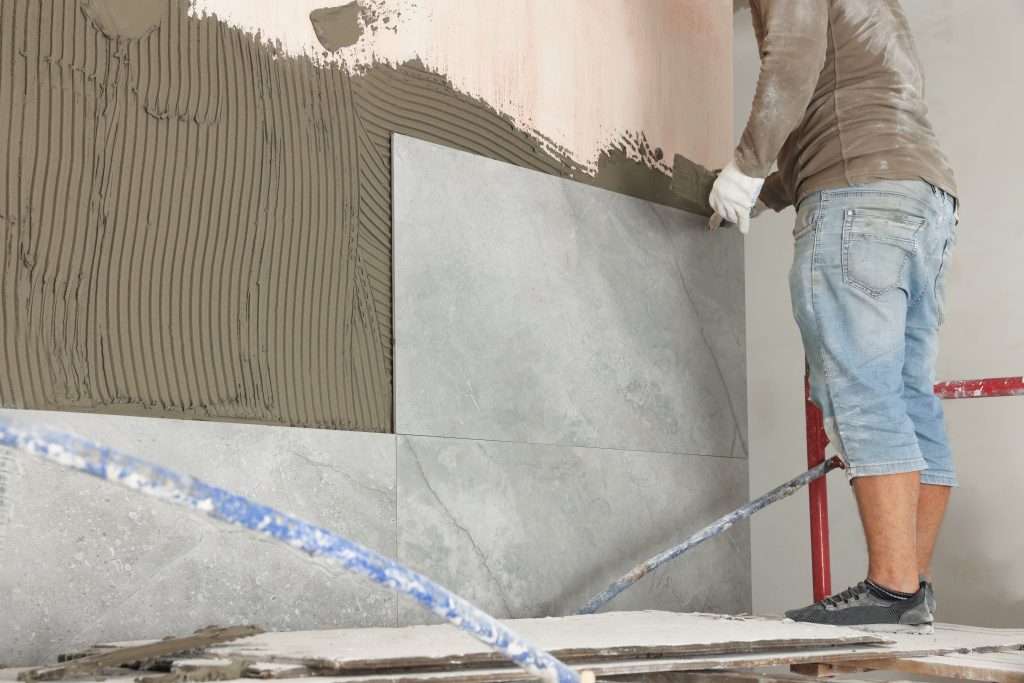 Why are tile adhesives for walls gaining popularity?