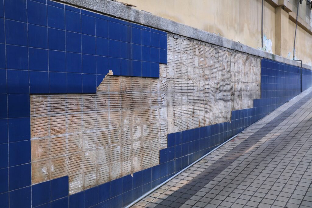 Why Do Tiles Fall Off Walls? Causes & Fixes